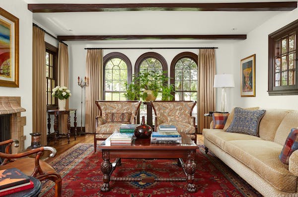 The living room, restored by David Heide Design Studio and Dovetail Renovation, looks just as it did before the fire.