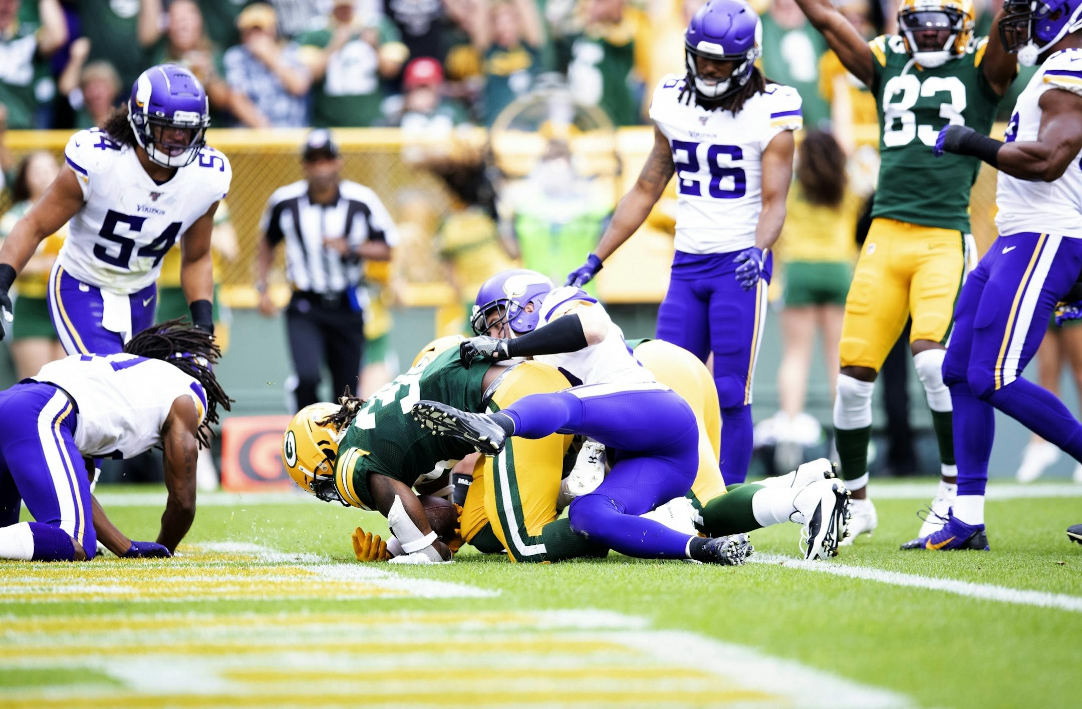 Green Bay's running back Jamaal Williams scores a touchdown on the Packers' opening drive.