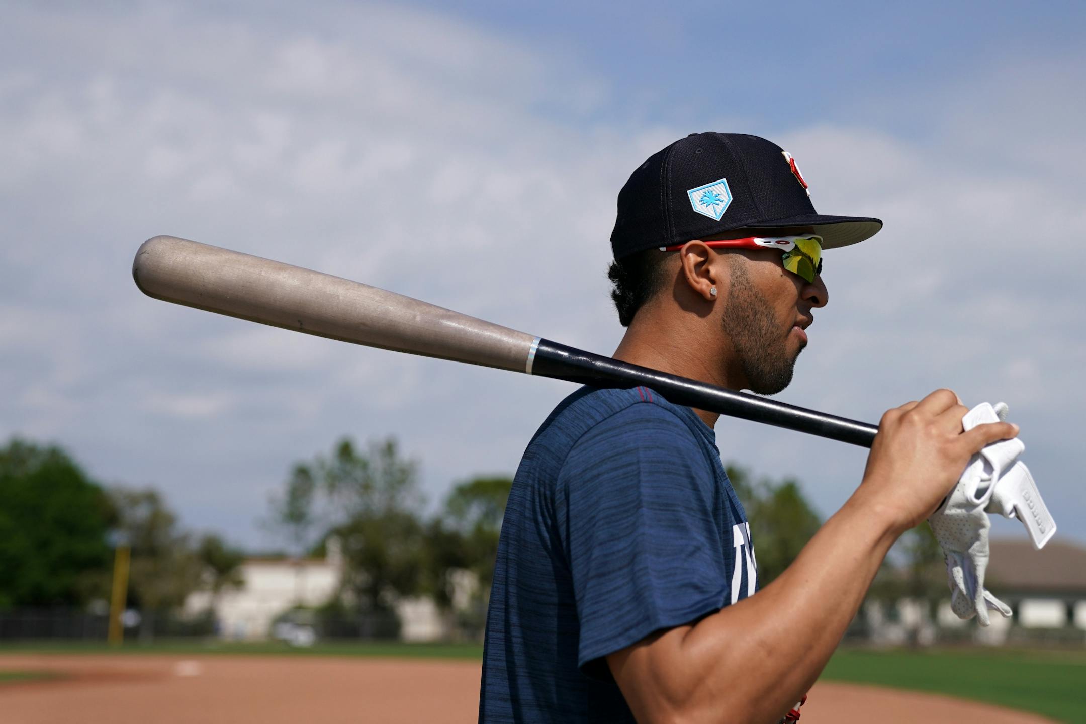 Minnesota Twins left fielder Eddie Rosario (20) walked back to the clubhouse after informal drills Saturday.