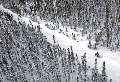 BRIAN PETERSON • brianp@startribune.com INTERNATIONAL FALLS, MN - January 31-Feb. 2nd ] The Arrowhead 135 Ultra Marathon, from International Falls to Tower Minnesota, follows the scenic and rugged Arrowhead State Snowmobile Trail and attracts some of the best ultra-athletes in the world. Competitiers can Bike, run or ski the 135 mile race that challenges the body and the mind and presents participants with some of the coldest conditions in ultra marathon racing. (IN THIS PHOTO) Being alone and c