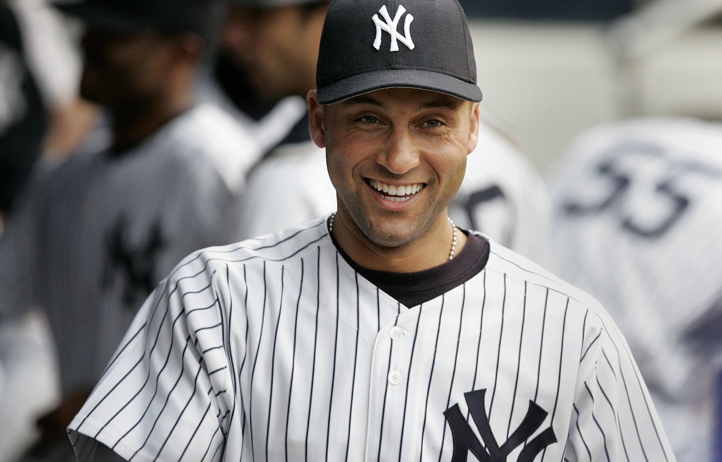 The New York Yankees' Derek Jeter smiles in the dugout shortly before the start of the game against the Detroit Tigers at Yankee Stadium in New York Thursday, May 26, 2005. The Yankees won, 4-3. (AP Photo/Gregory Bull) ORG XMIT: NYGB112