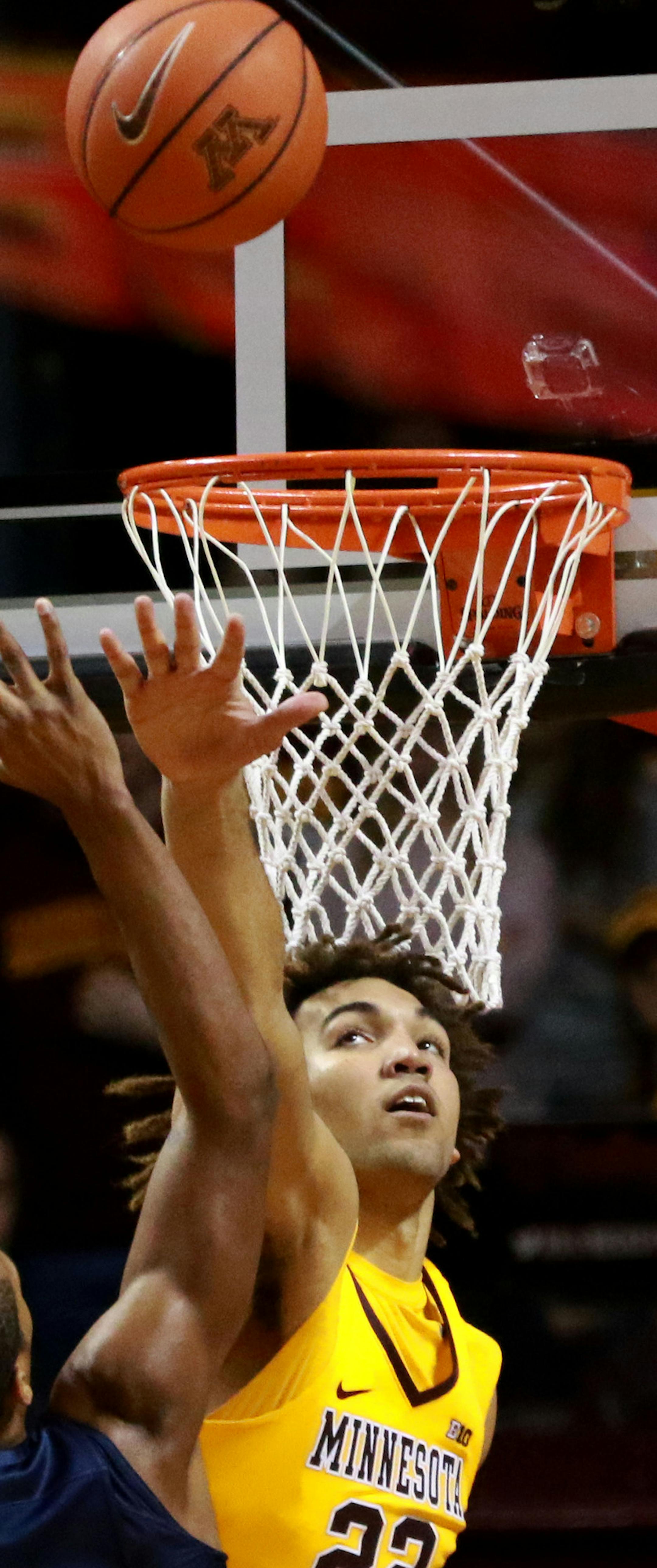 Minnesota's Reggie Lynch (22) with a second-half block on Penn State's Tony Carr (10) on Saturday, Feb. 25, 2017, at Williams Arena in Minneapolis. Minnesota won, 81-71. (David Joles/Minneapolis Star Tribune/TNS)