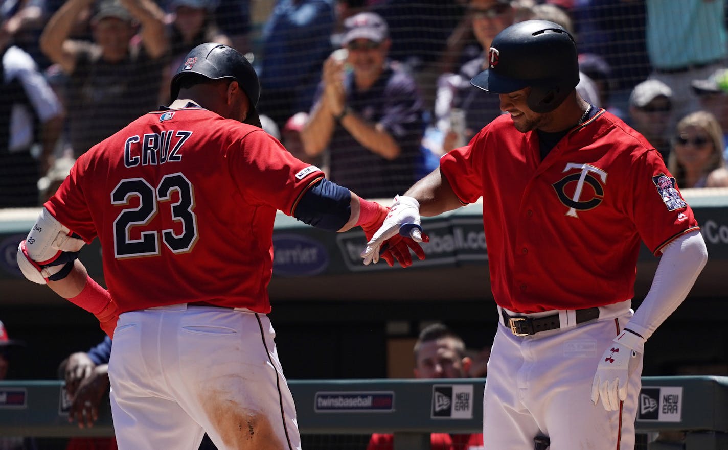 Minnesota Twins designated hitter Nelson Cruz (23) celebrated with Minnesota Twins second baseman Jonathan Schoop (16) after hitting a home run in the third inning. ] ANTHONY SOUFFLE &#x2022; anthony.souffle@startribune.com The Minnesota Twins played the Seattle Mariners in an MLB game Thursday, June 13, 2019 at Target Field in Minneapolis.