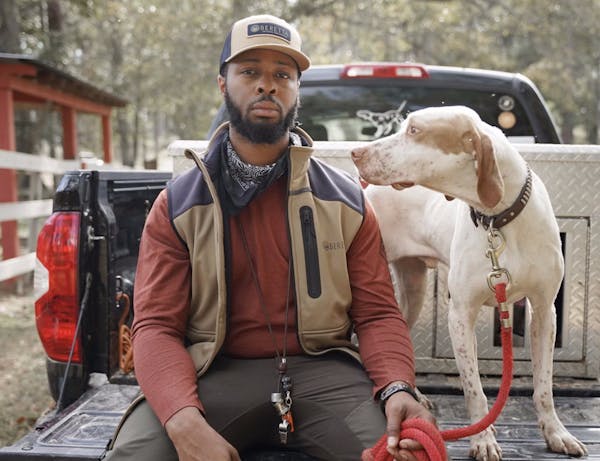 Durrell Smith, with his pointer, Jughead. Smith, a hunter, artist and conservationist, will visit Minneapolis on Sept. 9 as part of an event centered 