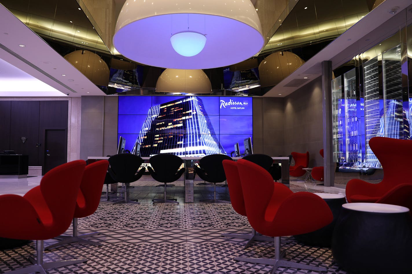 The lobby area of the Radisson Blu hotel in downtown Minneapolis is shown in this file photo from March 2018. (Photo by ANTHONY SOUFFLE &#x2022; anthony.souffle@startribune.com) Photo tour of the Radisson Blu hotel Wednesday, March 7, 2018 in downtown Minneapolis. The Radisson Blu hotel company recently underwent a rebranding, launch of loyalty program, and other company changes including expanding the number of hotels in the United States. ORG XMIT: MIN1803081348596324