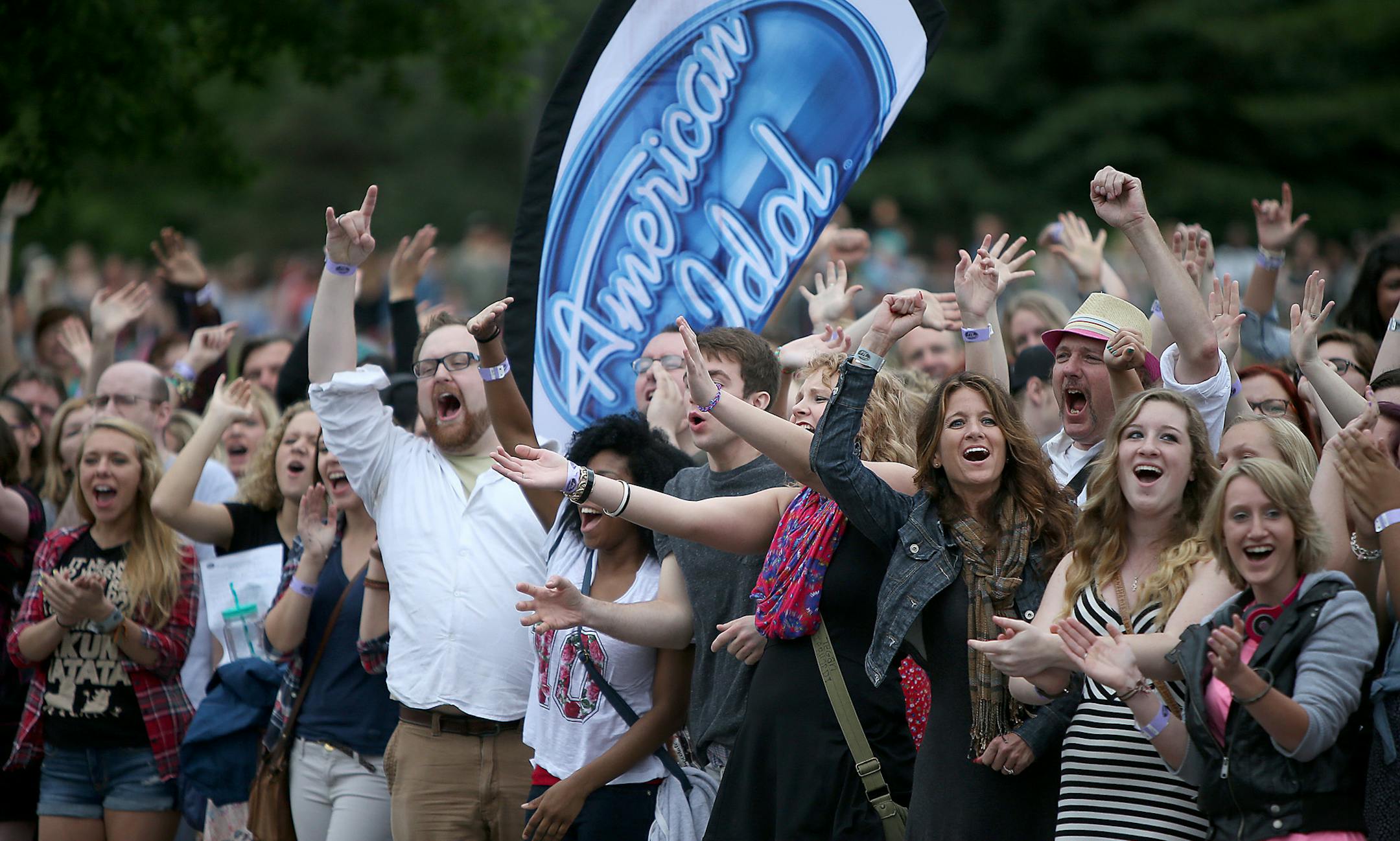 Hundreds of "American Idol" fans cheered as Ryan Seacrest, arrived for the kickoff its auditions for it's 14th Anniversary Show outside Mariucci Arena, Wednesday, June 18, 2014 in Minneapolis, MN. The last time the show was in Minneapolis was in 2006. ] (ELIZABETH FLORES/STAR TRIBUNE) ELIZABETH FLORES • eflores@startribune.com