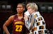 Former Minnesota head coach Marlene Stollings confers with guard Kenisha Bell (23) during a game against Ohio State in 2018.