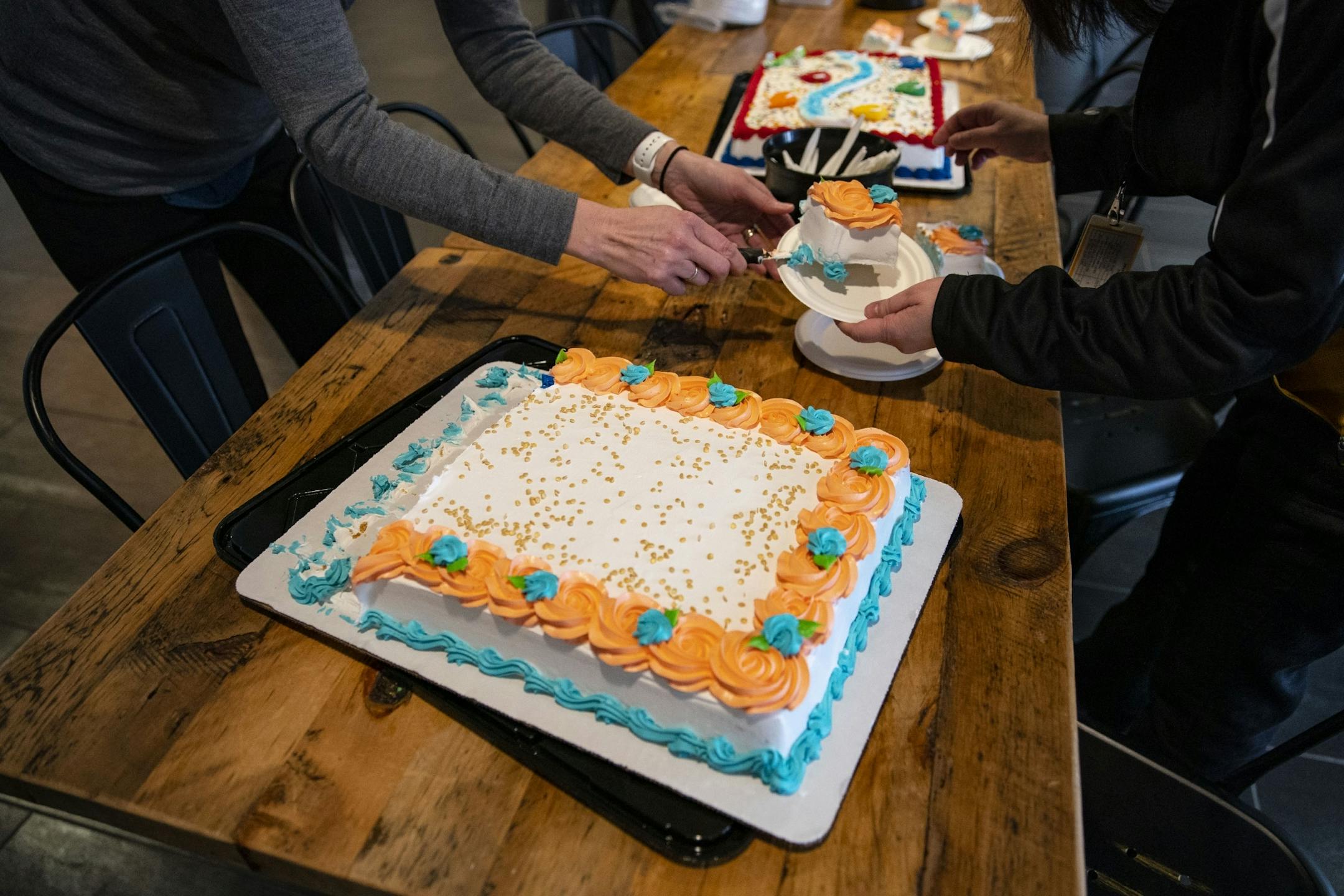Two cakes were brought out to celebrate the Duluth Marshall girl's basketball team after they were forced to return home early, following the cancellation of the MSHL girl's basketball tournament.