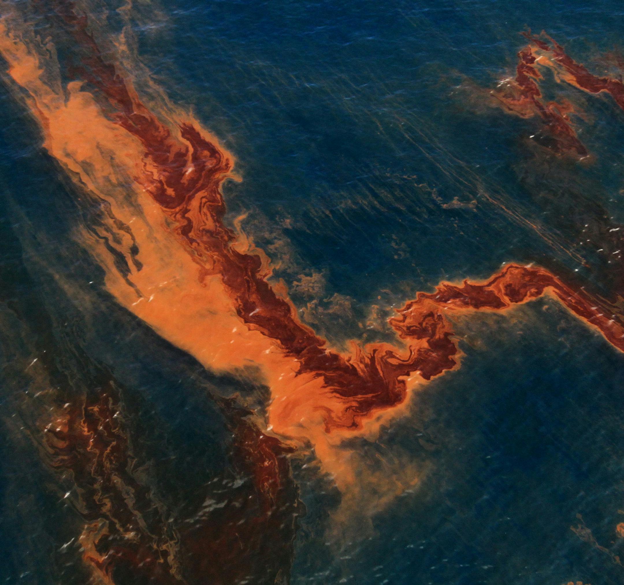 Oil and dispersant on the water's surface in the Gulf of Mexico on May 20, 2010, a month after the Deepwater Horizon oil spill began. (James Edward Bates/Biloxi Sun Herald/TNS)