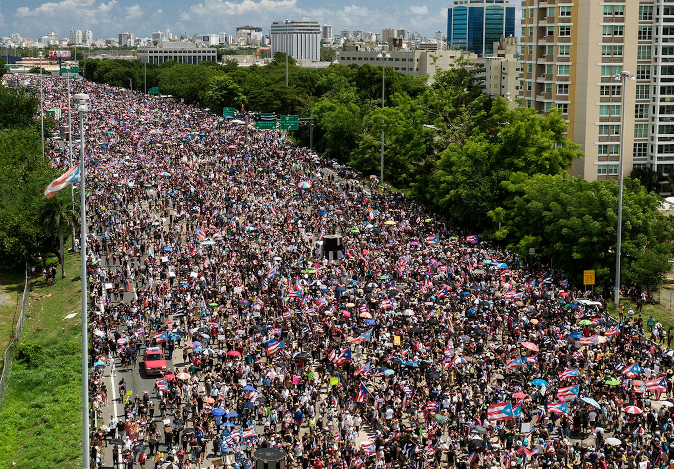 Thousands of Puerto Ricans march on the Las Americas expressway calling for Puerto Rican governor Ricardo "Ricky" Antonio Rossello Nevares' resignation following the release of leaked private chats, on Monday, July 22, 2019.