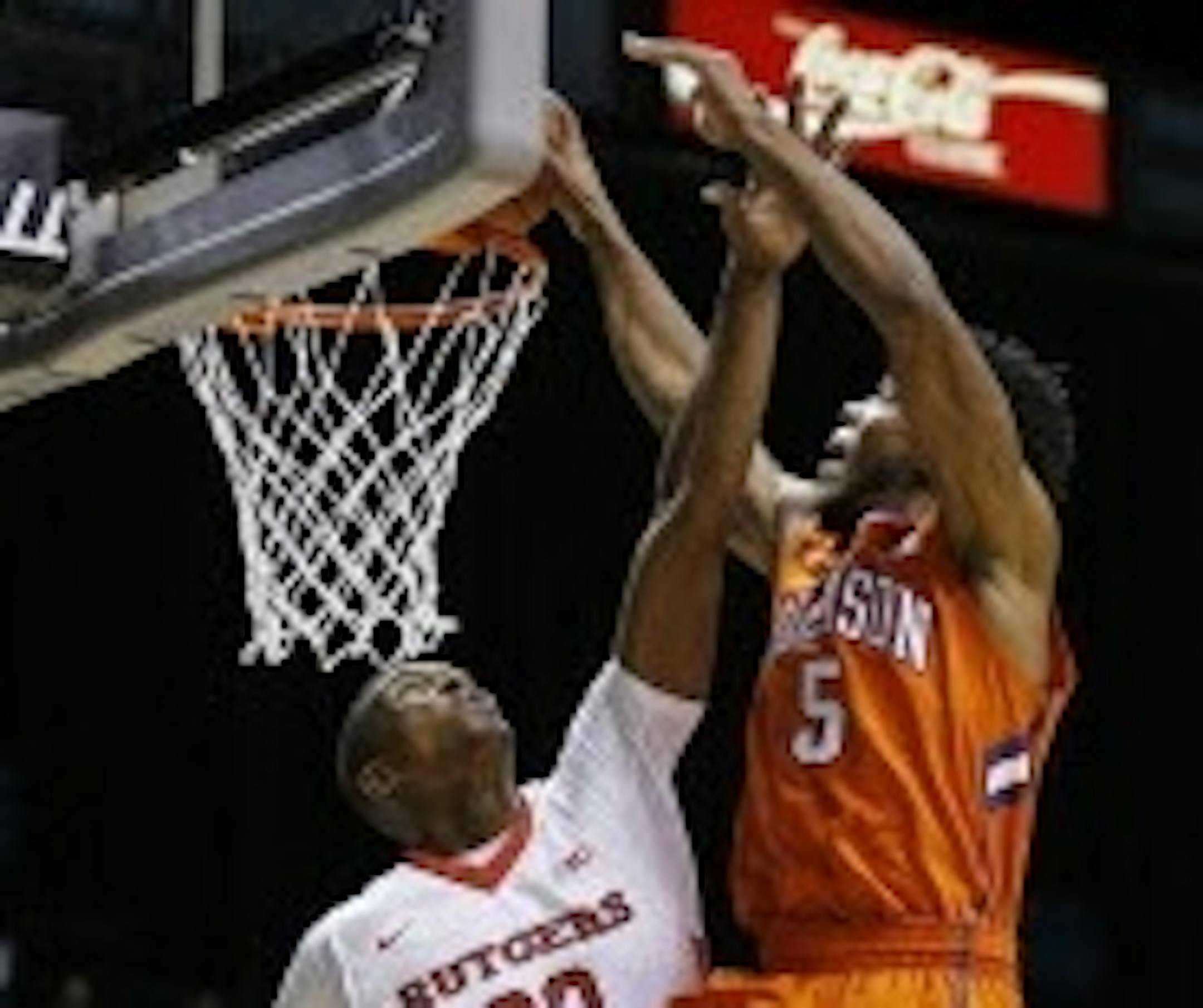 Clemson's Jaron Blossomgame (5) was fouled by Rutgers forward Ibrahima Diallo during the first half of a Nov. 25 game in Las Vegas.
