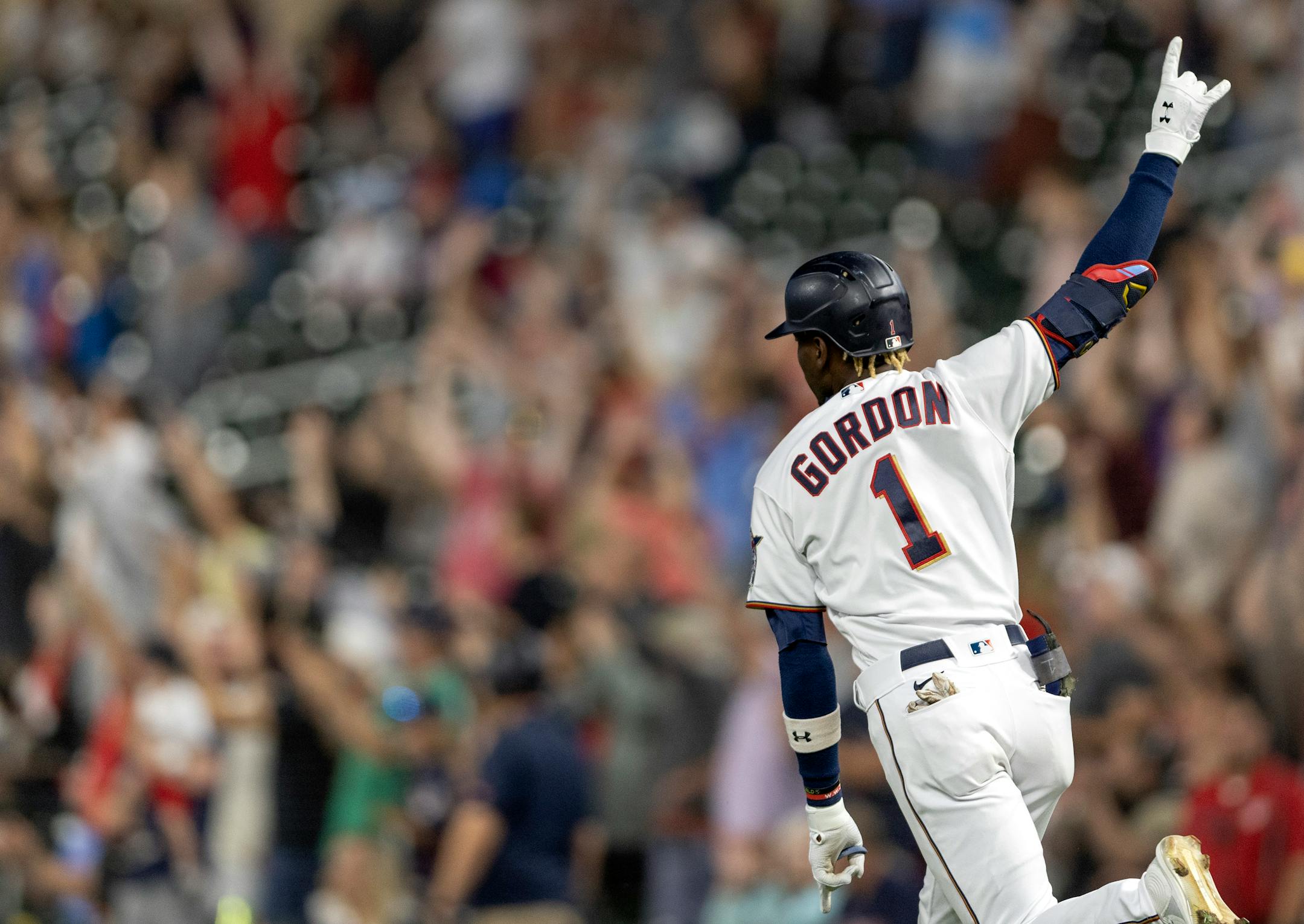 Nick Gordon of the Minnesota Twins celebrates after hitting a grand slam home run in the fifth inning.