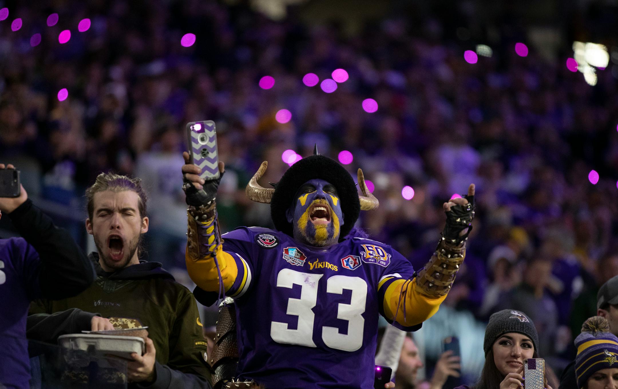 Vikings fans cheered under purple lights during player introductions last season