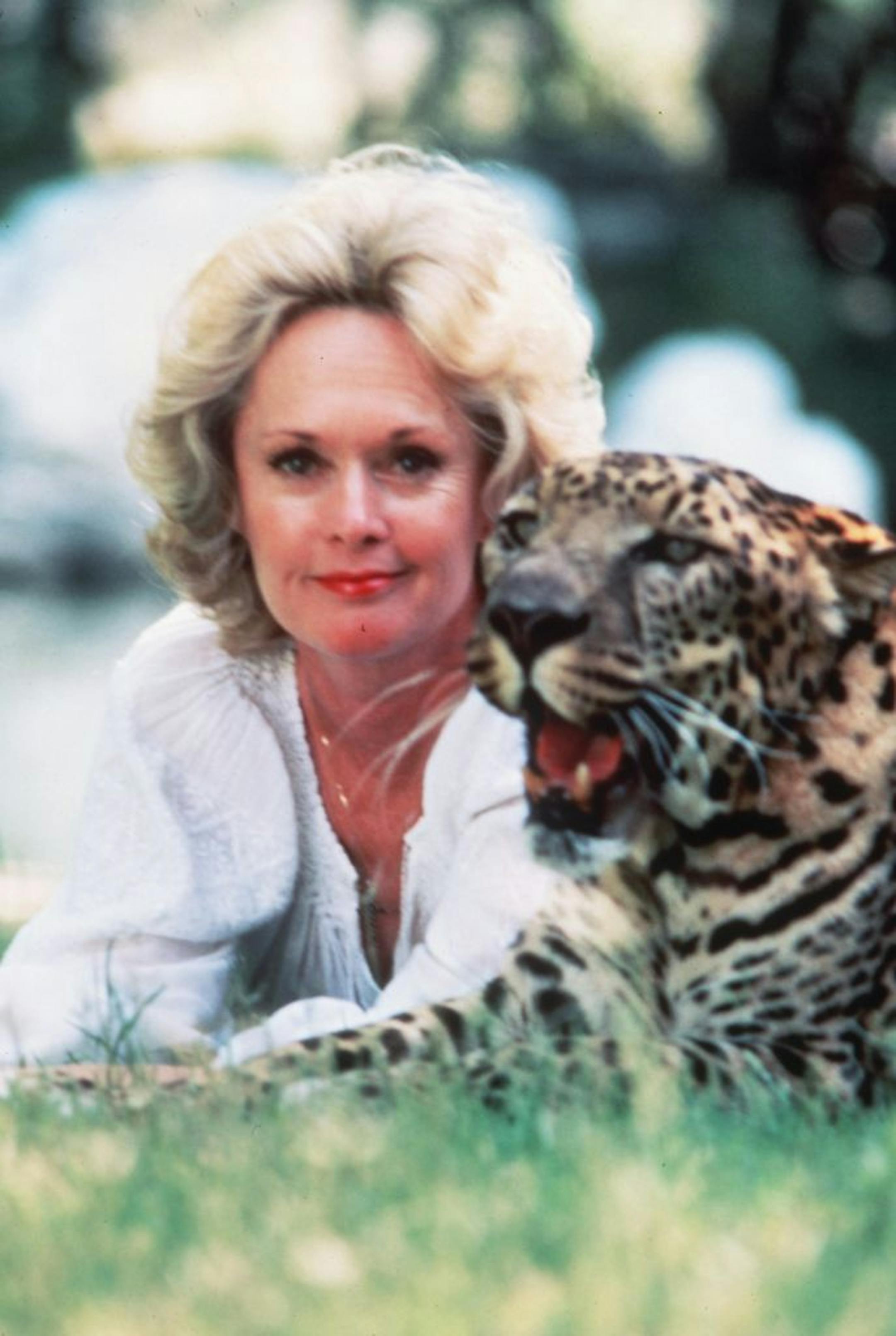 1MNMADE0119 for Tues Jan 19, 2005, page B3 -- Tippi Hedren and friend during the filming of "Roar" in 1970's. Handout photo.