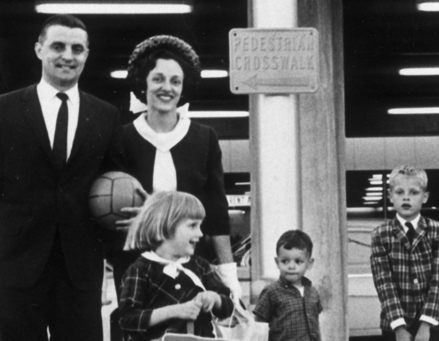 Walter & Joan Mondale are shown with children Eleanor (age 5), William (age 3), and Teddy (age 7) at the Minneapolis St. Paul International Airport. June 1965 Star Tribune staff photo by Bob Schranck.