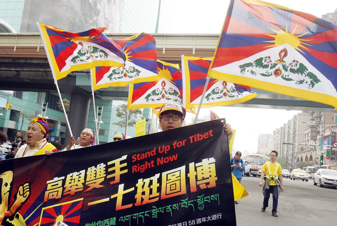 Tibetans living in Taiwan and supporters of Tibetans shout slogans during a protest in Taipei, Taiwan, on March 5 to mark the 58th anniversary of the failed 1959 Tibetan uprising against Chinese rule.