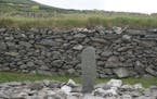 An Ogham stone at the Gallarus Oratory
