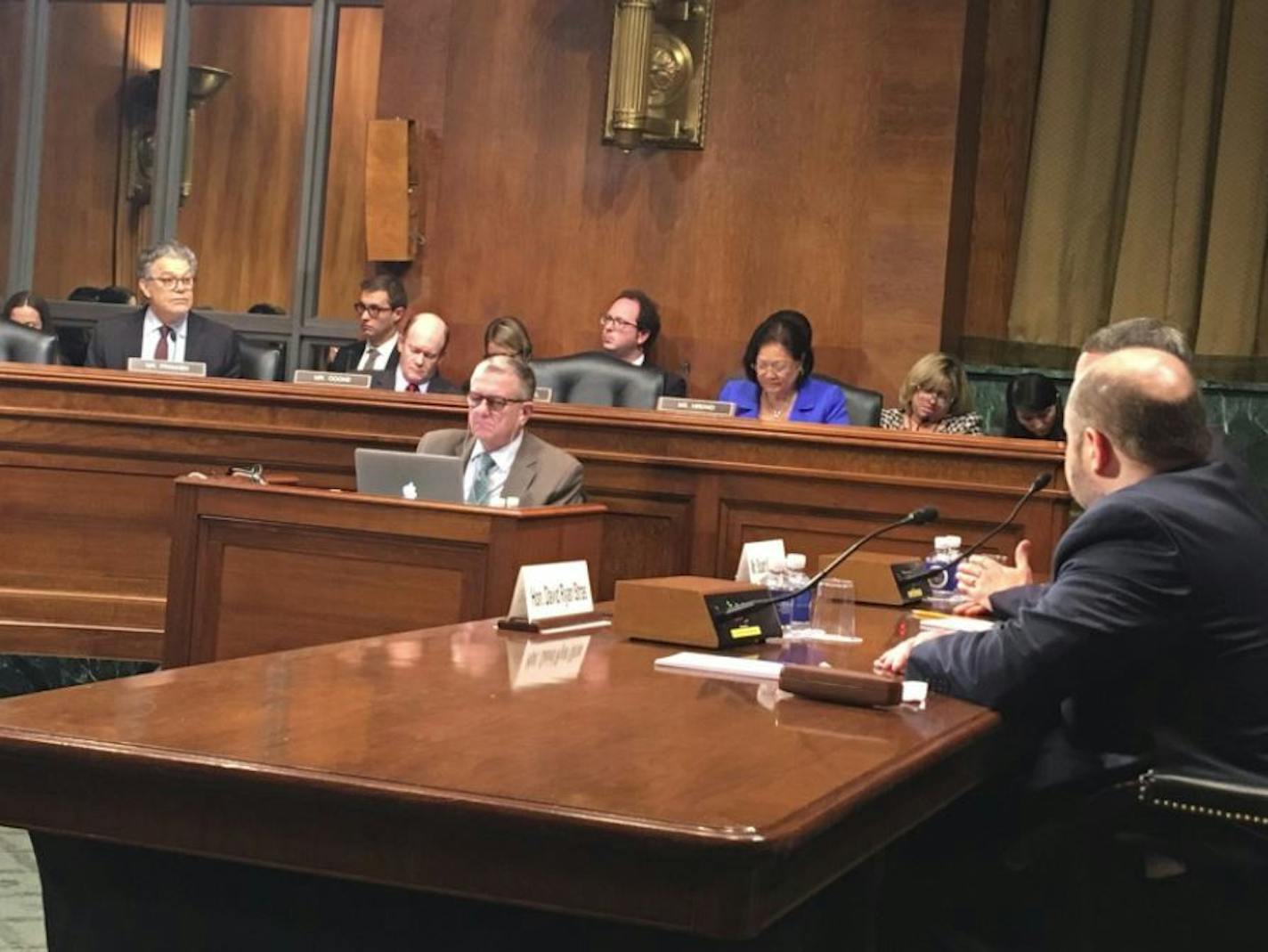 Sen. Al Franken questions Minnesota Supreme Court Justice David Stras at a Senate hearing over his nomination to the federal bench.