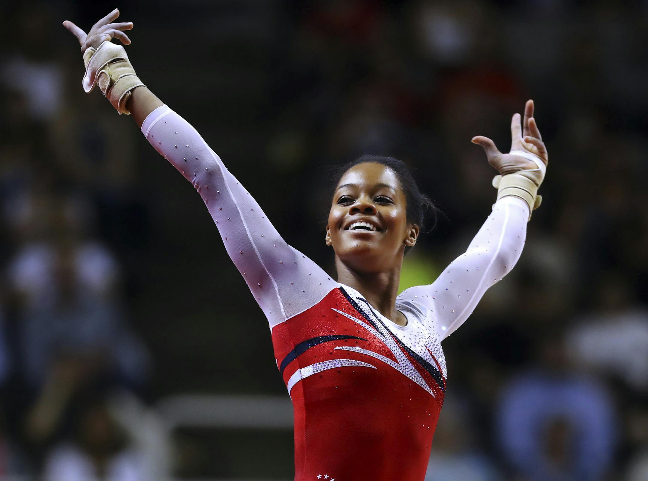 Gabby Douglas competes on the floor exercise on Day 2 of the womenís gymnastics U.S. Olympic Trials at the SAP Center in San Jose, Calif., July 10, 2016. Douglas secured her spot on the U.S. Olympic women's gymnastics team. (Chang W. Lee/The New York Times)