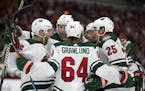 The Minnesota Wild celebrate a goal by Jonas Brodin's (25) against the Chicago Blackhawks during the second period on Wednesday, Jan. 10, 2018, at the