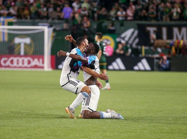 Minnesota United celebrates defeating the Portland Timbers after an MLS soccer match at Providence Park in Portland, Ore. on Saturday, May 20, 2023. (