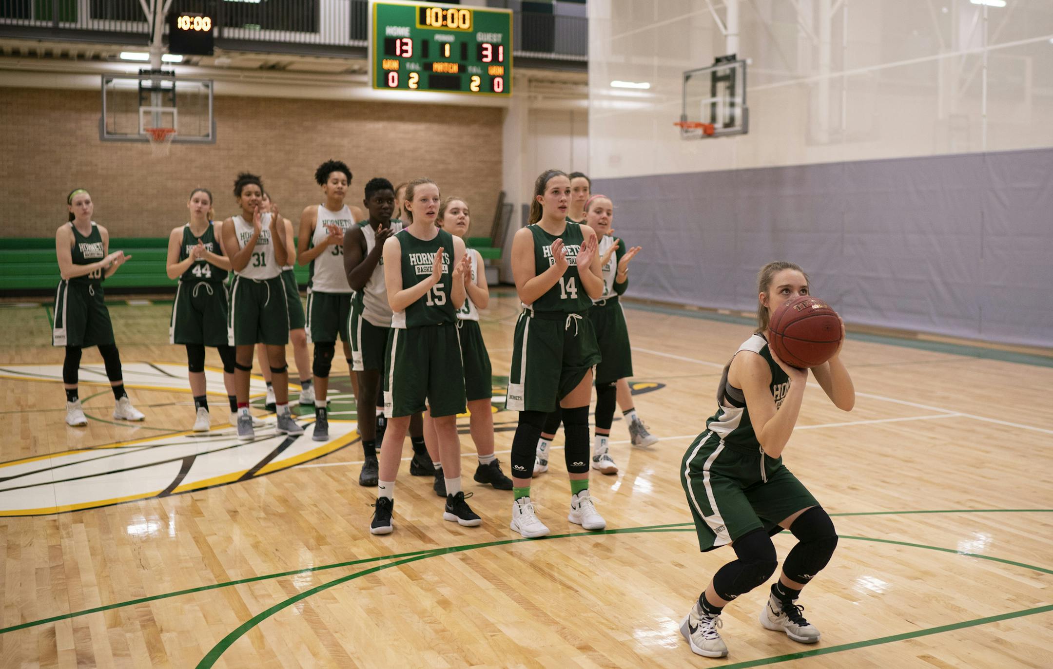 Evie Dunning prepared to shoot a free throw.