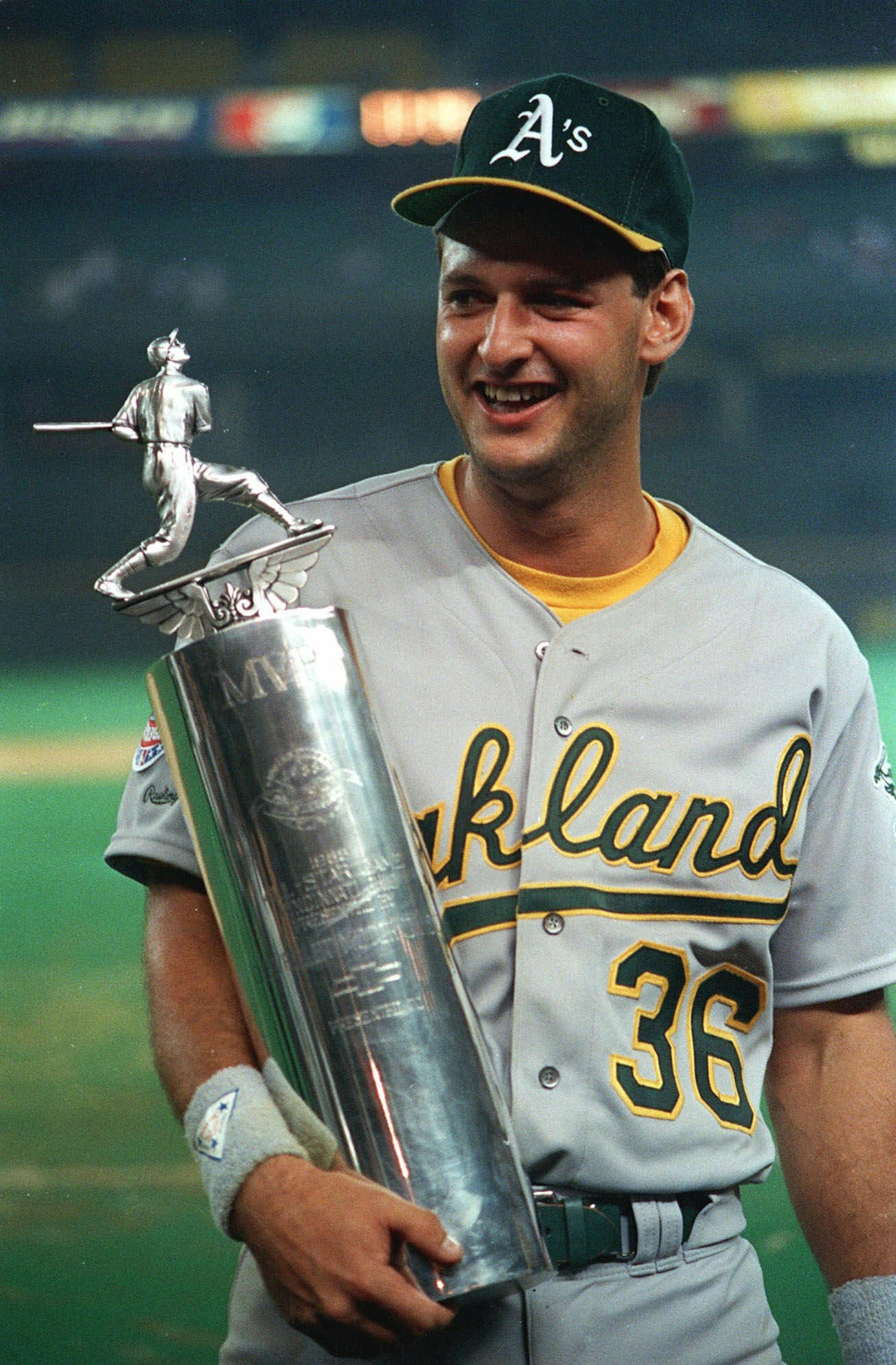 Oakland A's Terry Steinbach holds his Most Valuable Player trophy after being selected as the top player in the All-Star game in Cincinnati, in this July 13, 1988 photo.