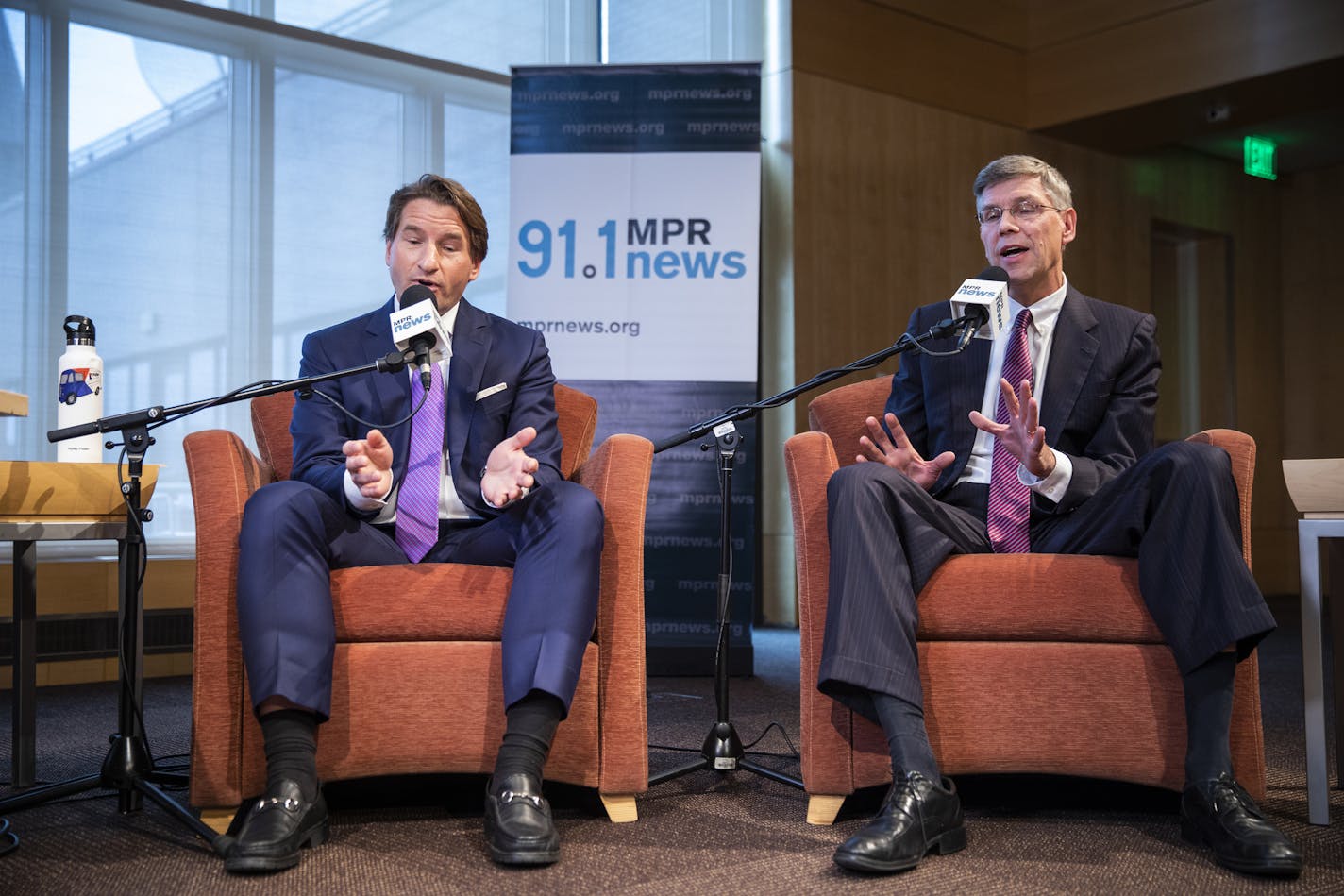 Rep. Erik Paulsen, right, and his Democratic challenger Dean Phillips both speak during their debate.