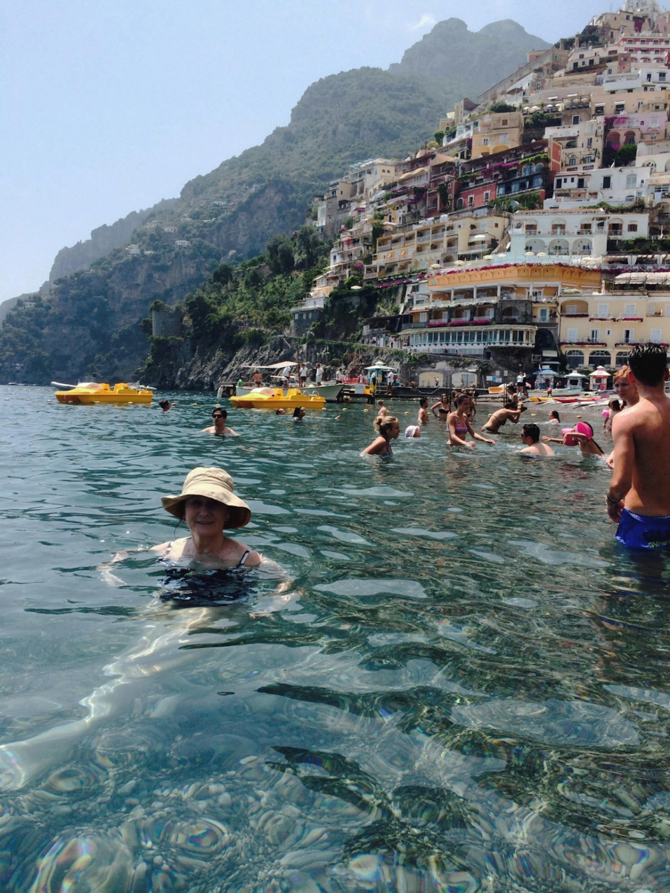 Margie Brackin is the true adventurer in our family, coaxing husband Dennis into a swin in Positano�s public beach.
