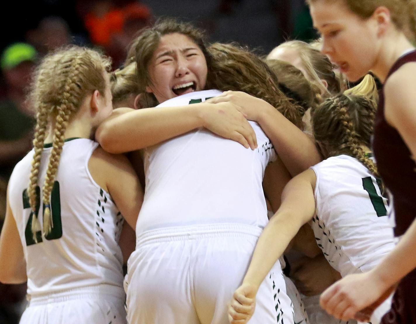 Roseau players celebrate at the end of their 75-64 victory over Sauk Centre during the girls' basketball state tournament, Class 2A championship Saturday, March 18, 2017, at Williams Arena on the University of Minnesota campus in Minneapolis, MN.] DAVID JOLES &#xef; david.joles@startribune.com girls' basketball state tournament