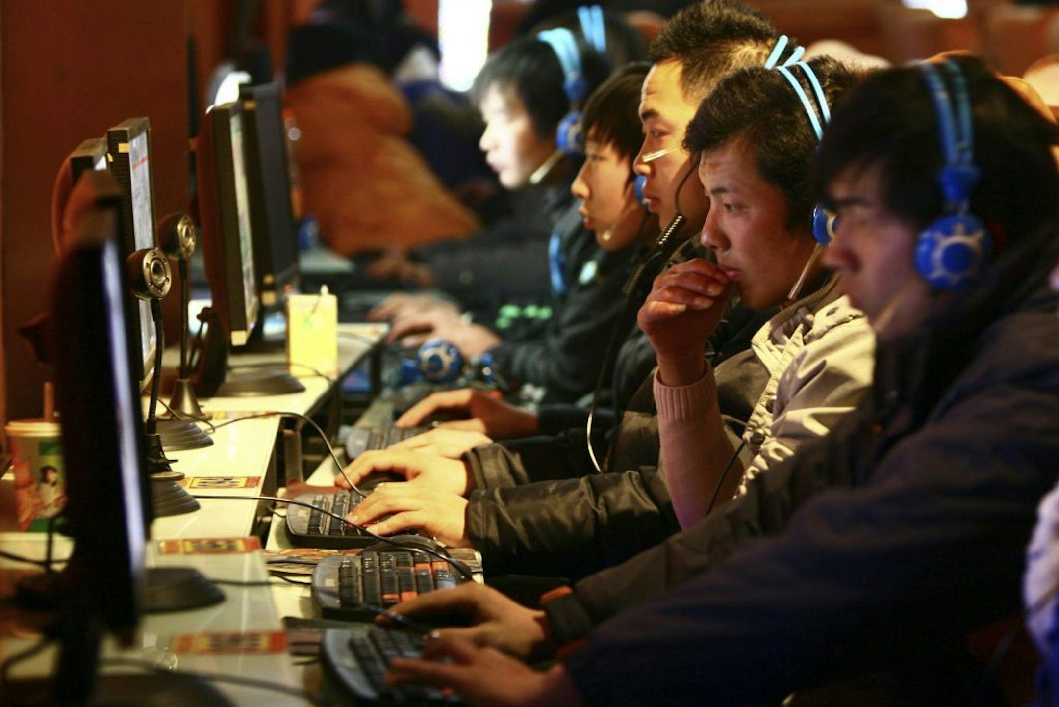 FILE - In this file photo taken Friday, Jan. 15, 2010, people use computers at an Internet cafe in Fuyang in central China's Anhui province. This week's news that a Russian crime ring has amassed some 1.2 billion username and password combinations makes now a good time to review ways to protect yourself online. The hacking misdeeds were described in a New York Times story based on the findings of Hold Security, a Milwaukee firm that has a history of uncovering online security breaches.