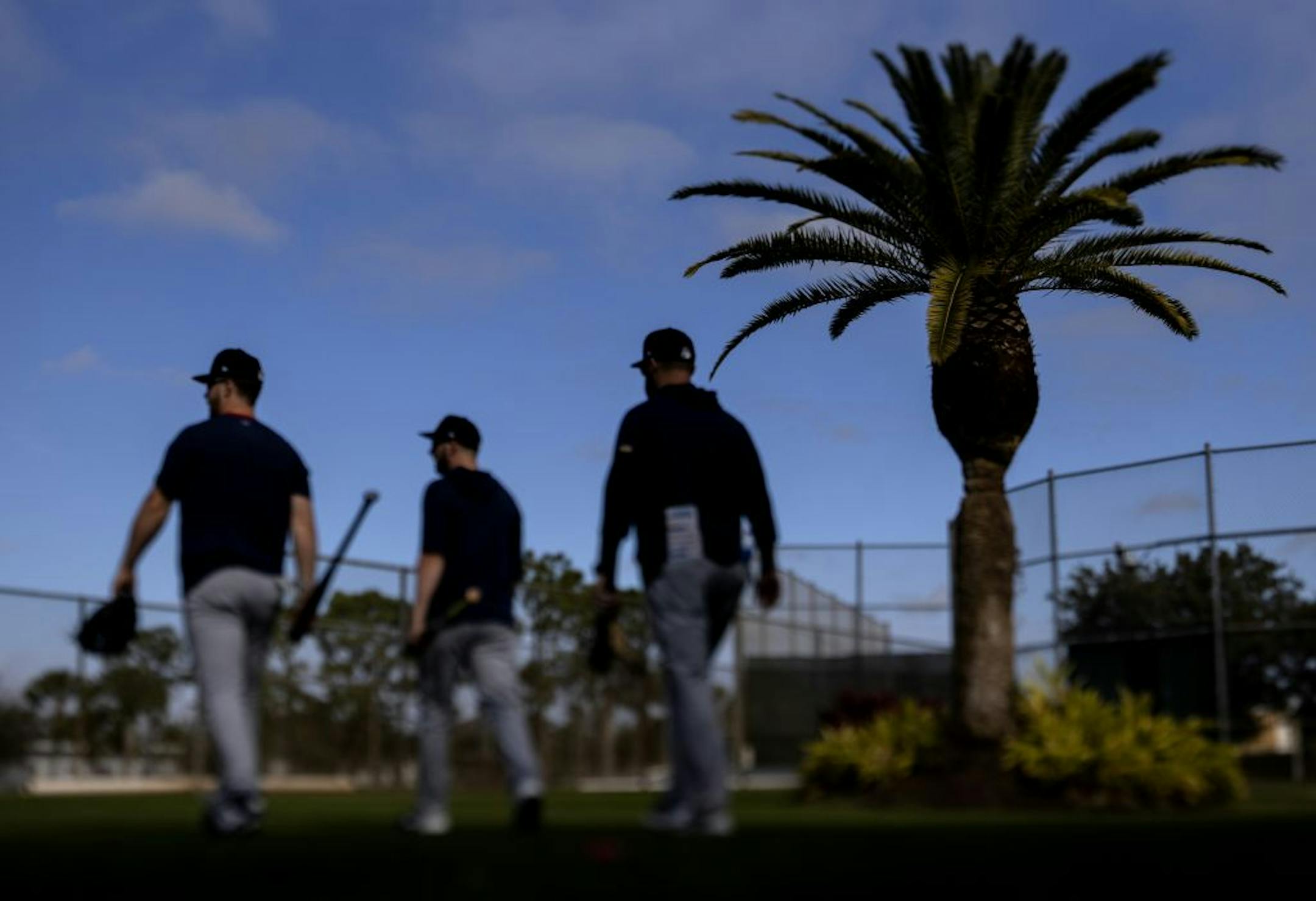 Minnesota Twins coaches walked out on the field for practice on Sunday.