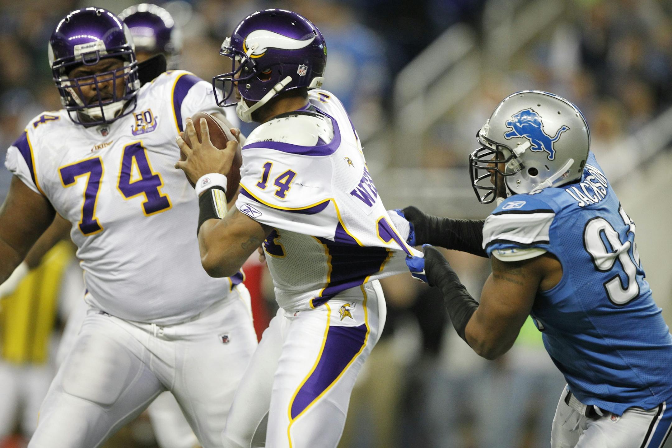Lawrence Jackson sacked Vikings quarterback Joe Webb during a 2011 game between Minnesota and Detroit.