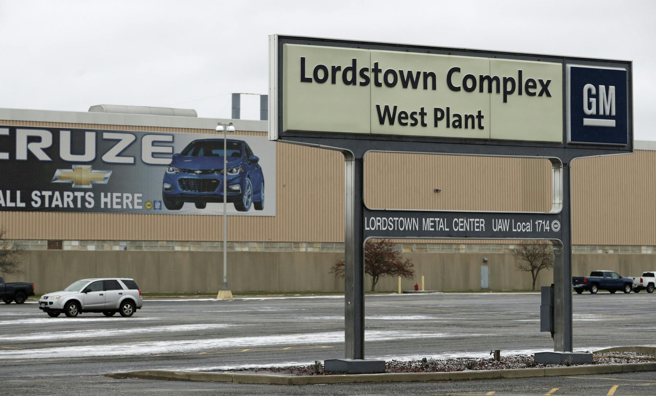 A sign is displayed at General Motors Lordstown West plant Tuesday, Nov. 27, 2018, in Lordstown, Ohio. Even though unemployment is low, the economy is growing and U.S. auto sales are near historic highs, GM is cutting thousands of jobs in a major restructuring aimed at generating cash to spend on innovation. GM put five plants up for possible closure, including the plant in Lordstown. (AP Photo/Tony Dejak) ORG XMIT: OHTD107