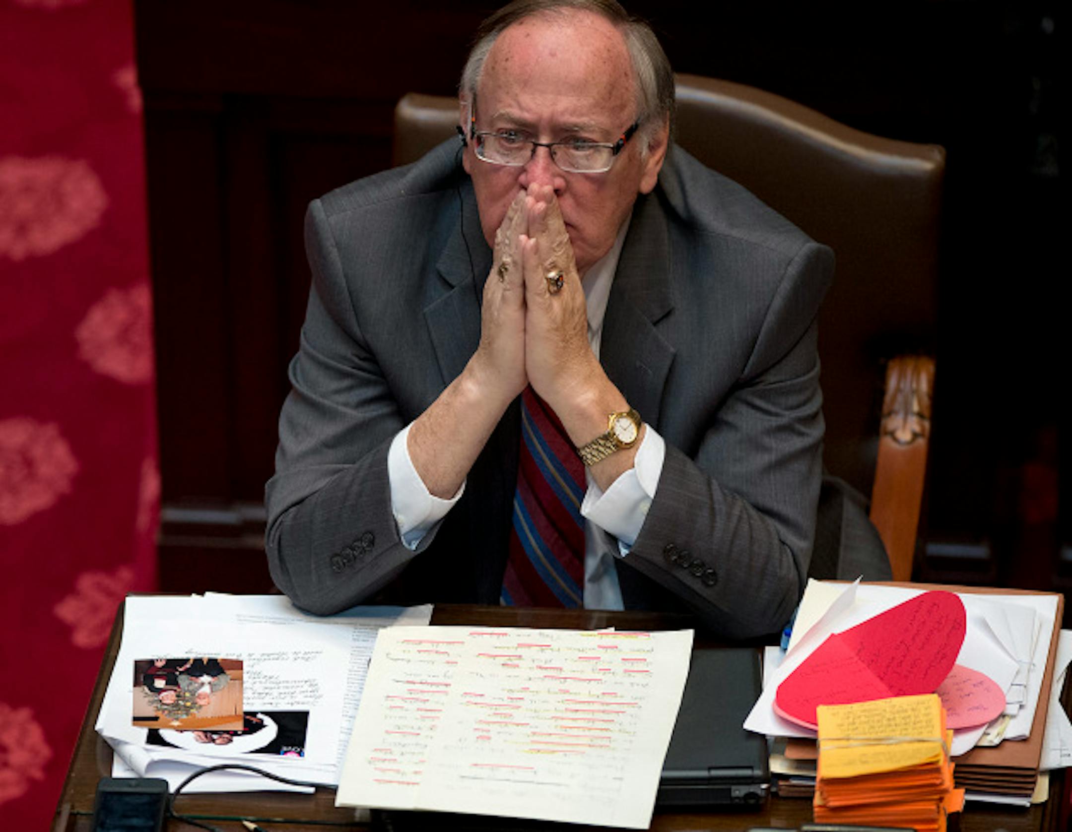 Sen David Senjem listened to the floor debate, his desk covered with letters and pictures from advocates from both sides of the issue.   Monday, May 13, 2013    ]   GLEN STUBBE * gstubbe@startribune.com