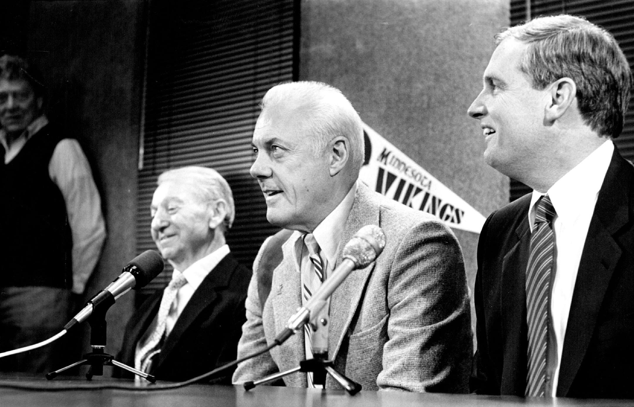 Bud Grant took a seat between Max Winter, left, and Mike Lynn after accepting an offer in December, 1984, to coach the Vikings again.