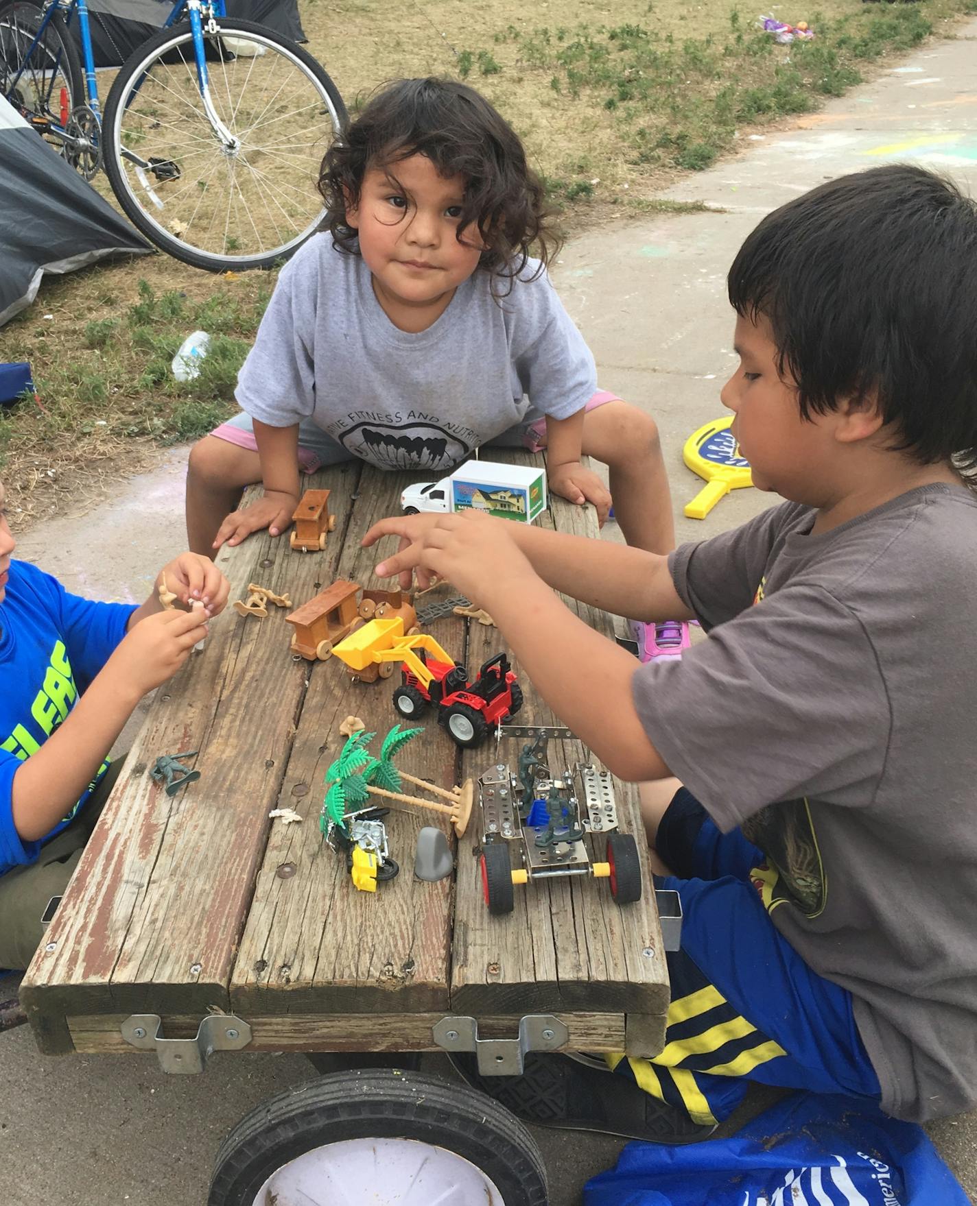 Koda Deer, 4, (center) is among a family of six who moved into the growing homeless encampment in south Minneapolis, hoping to access stable housing and other services.