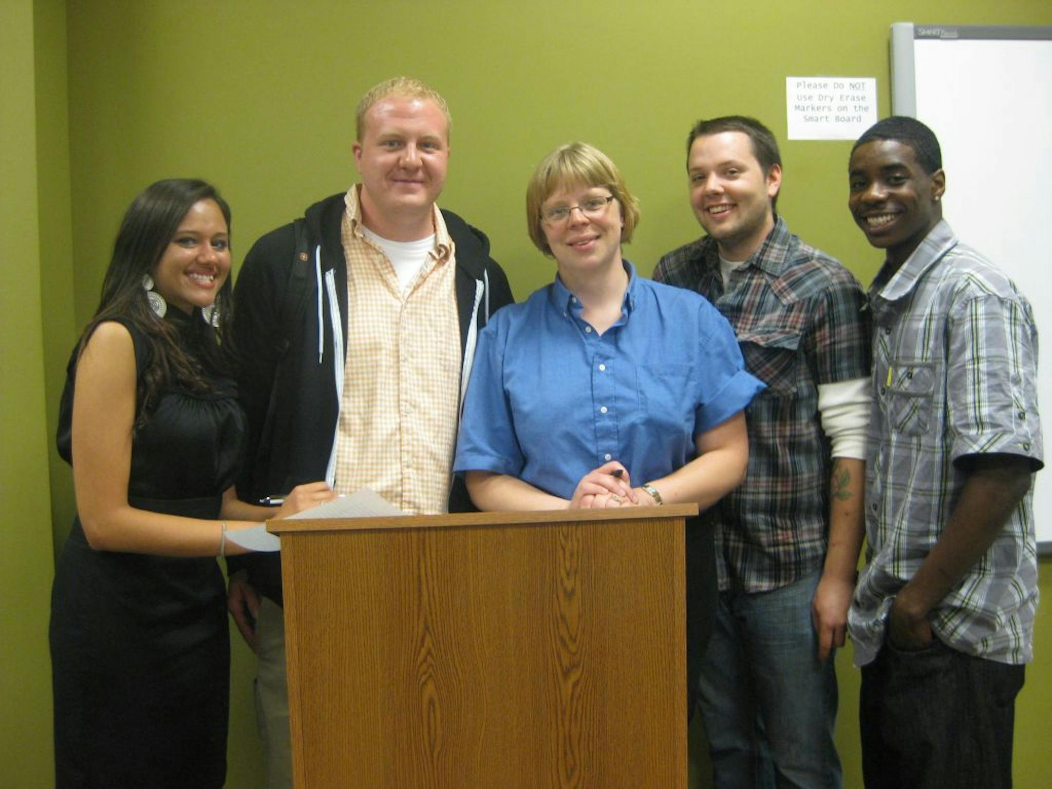Globe University students, from left, Riham Elkaramany, Joshua Stadtherr, Debbie Vinge, Max Girard and Richard Smith discussed the merits and flaws of a joint-custody bill in the Legislature.