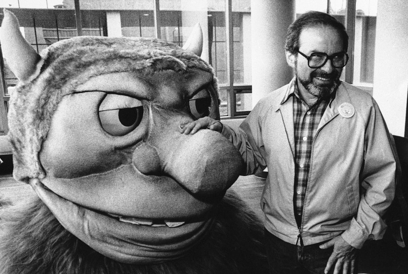 Maurice Sendak posed with one of the characters from "Where the Wild Things Are," designed for the operatic adaptation of his book in St. Paul, in September 1985.