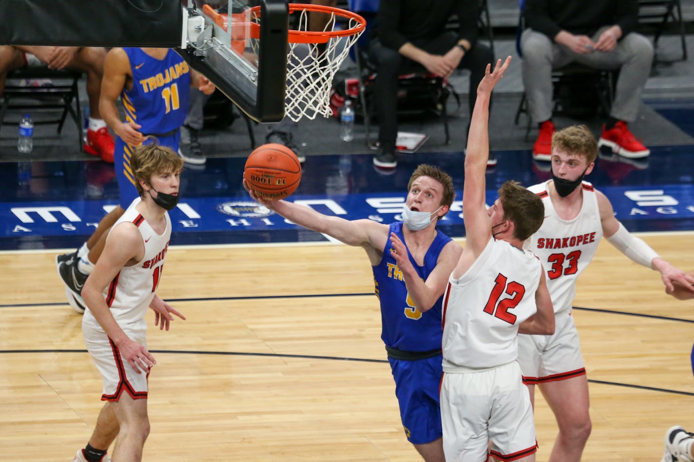 Wayzata's Eddie Beeninga is fouled as he puts up a shot against Shakopee