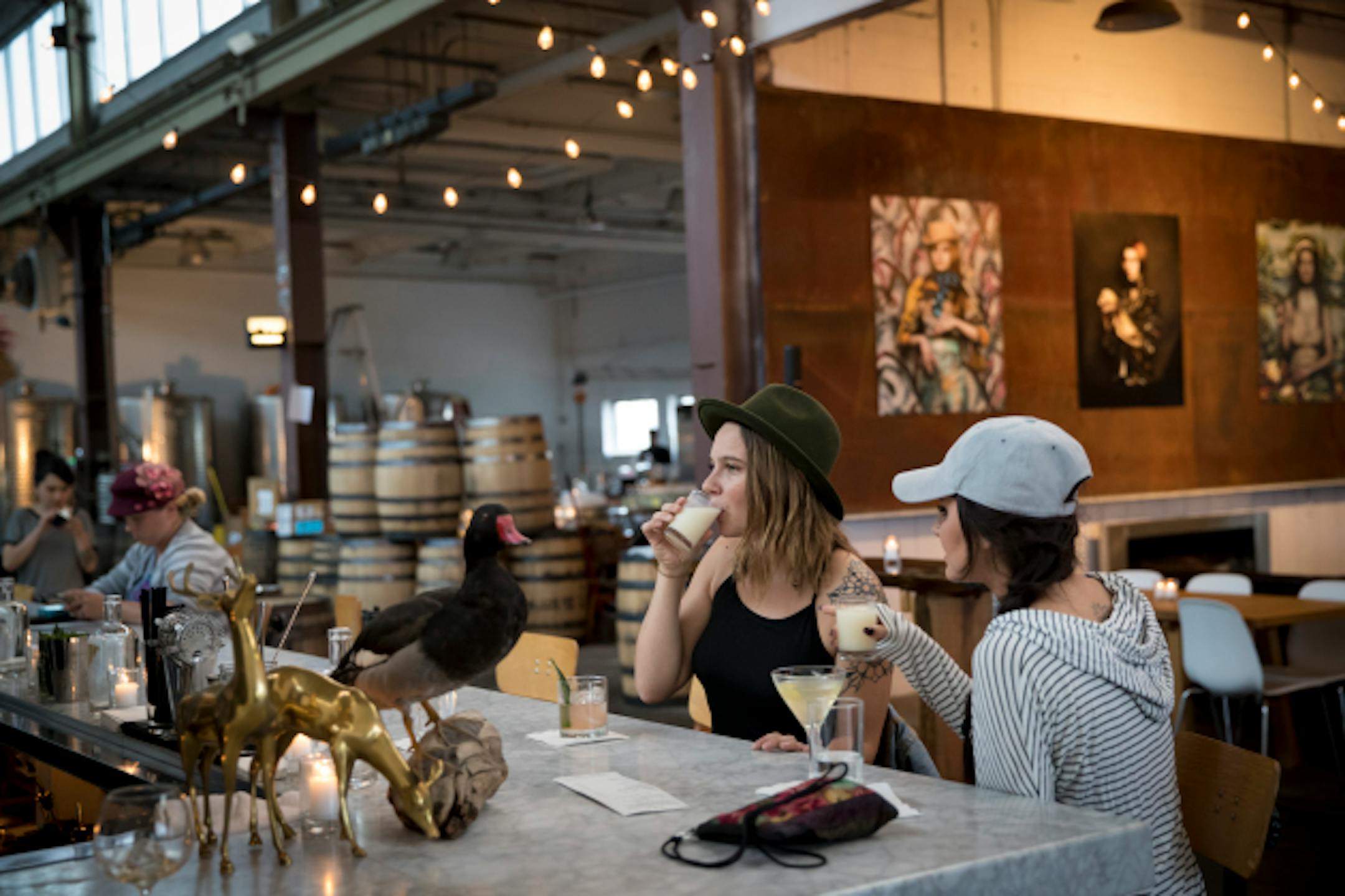 Corrin Turkowitch and Sophie Gori took sips from a frozen mixed drink at Norseman Distillery in Minneapolis, Minn. Photographed on Thursday, September 22, 2016. ] RENEE JONES SCHNEIDER ' renee.jones@startribune.com