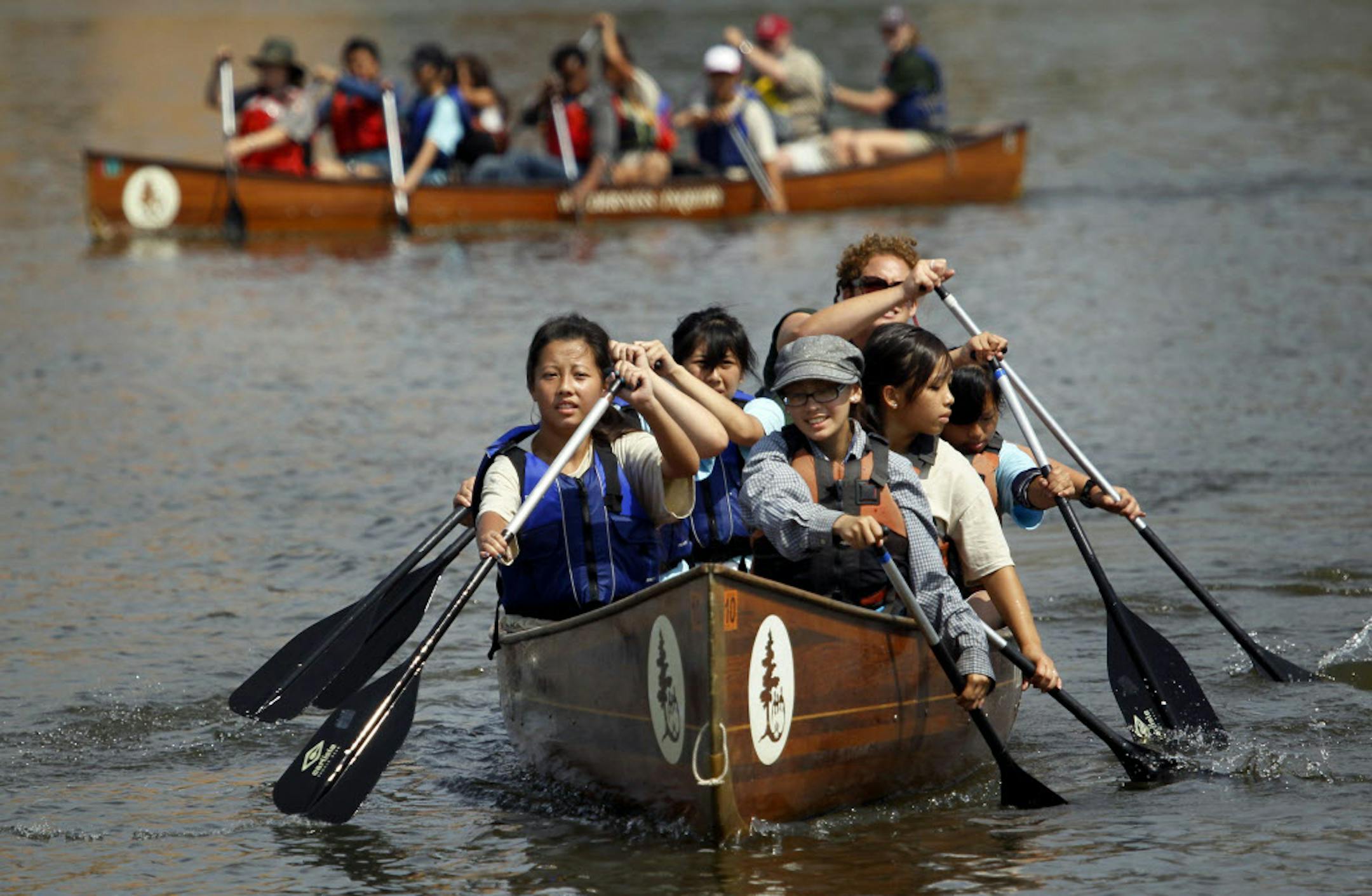 BRIAN PETERSON ‚Ä¢ brianp@startribune.com SAINT PAUL, MN 8/4/2010 ] With the help of Minneapolis based Wilderness Inquiry and the National Park Service, more than 60 young paddlers participating in a Let‚Äôs Move Outside Junior Ranger Program arrived at Harriet Island by voyageur canoe. Obama Administration officials, Congresswoman Betty McCollum, Congressman Keith Ellison, Minneapolis Mayor R.T. Rybak, Saint Paul Deputy Mayor Ann Mulholland, NPS Midwest Regiona