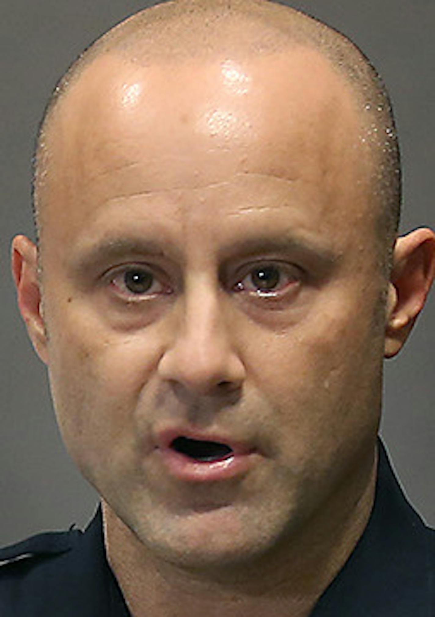 New Hope Police Chief Tim Fournier addressed the media alongside Hennepin County Sheriff Richard W. Stanek, left, regarding Raymond Kmetz, the man who shot two New Hope police officers outside a City Council meeting Monday, during a press conference at the New Hope City Hall, Wednesday, January 28, 205 in New Hope, MN. ] (ELIZABETH FLORES/STAR TRIBUNE) ELIZABETH FLORES &#x2022; eflores@startribune.com