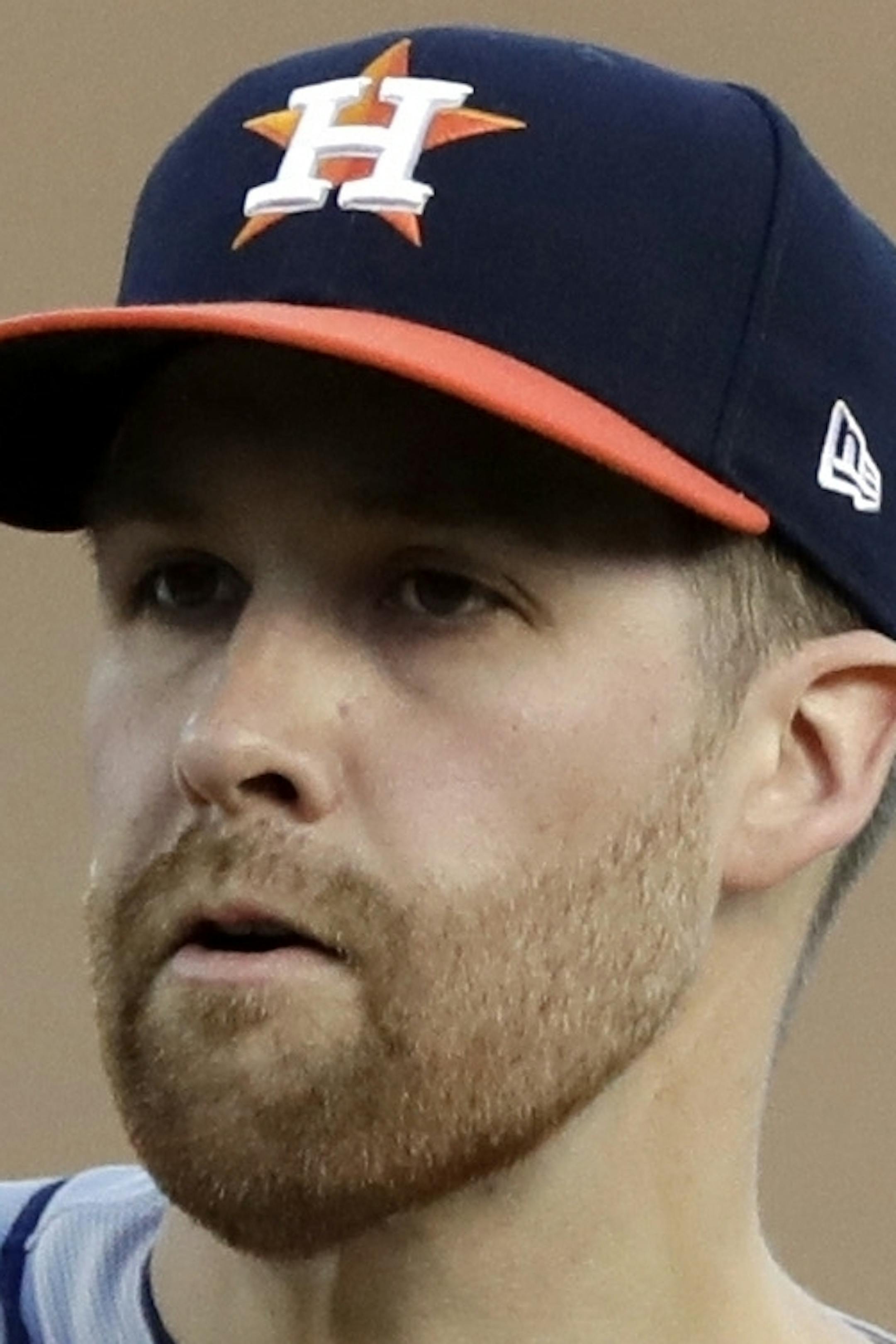FILE - In this Saturday, July 29, 2017 file photo, Houston Astros starting pitcher Collin McHugh throws during the first inning of a baseball game against the Detroit Tigers in Detroit. Collin McHugh became the second pitcher on the World Series Houston Astros to go to salary arbitration, asking for a raise from $3.85 million to $5 million. Houston argued for a $4.55 million salary in a hearing, Tuesday, Feb. 13, 2018 before Mark Burstein, Jeanne Wood and Allen Ponak. (AP Photo/Carlos Osorio, Fi
