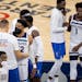 Karl-Anthony Towns (32) and Anthony Edwards (1) of the Minnesota Timberwolves greeted Dallas Mavericks players at the end of the game.