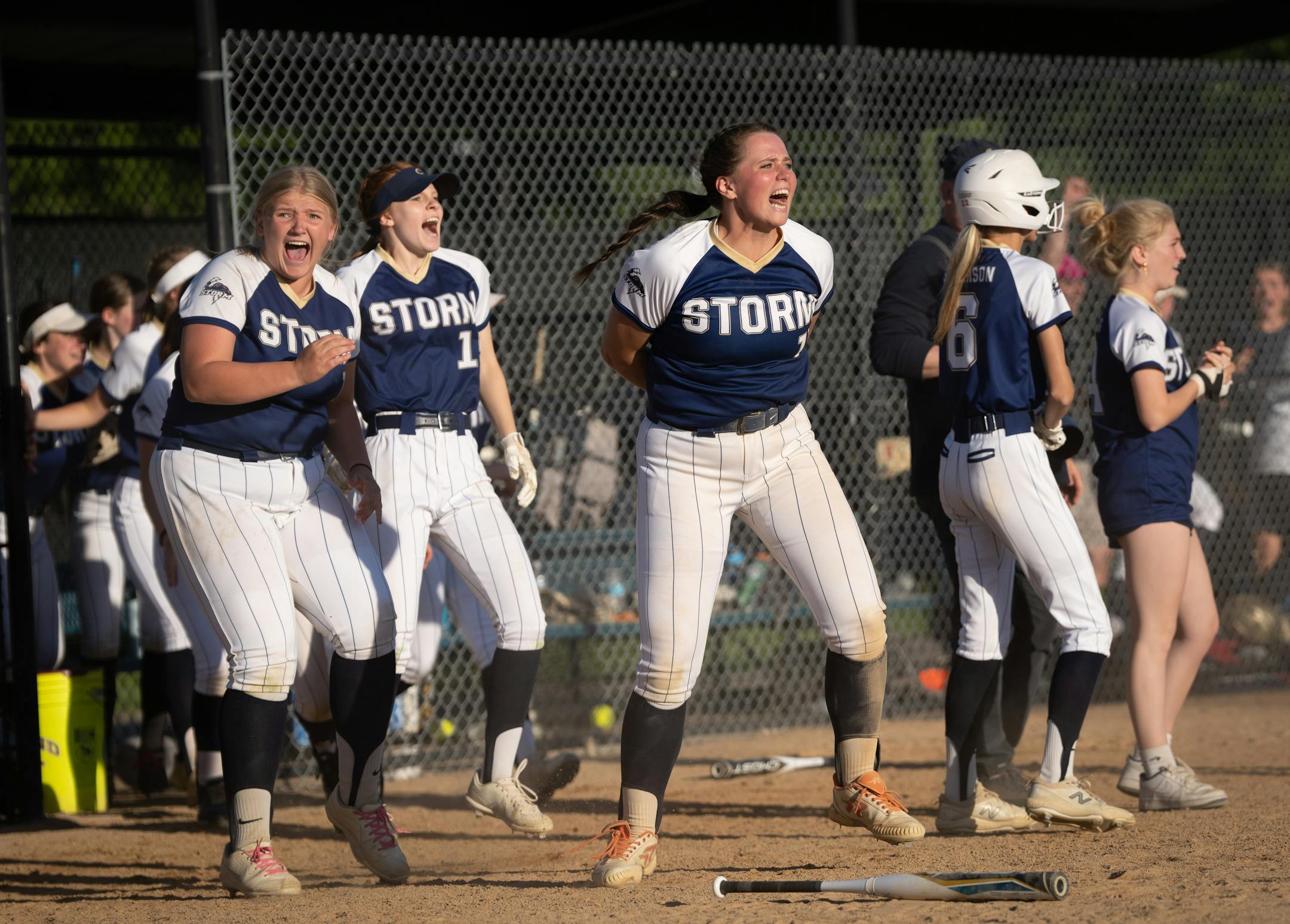 Chanhassen players celebrate as Kenna Berman (2) hit an RBI in the bottom of the seventh inning to win the Class 4A championship game against Shakopee on Thursday, June 2, 2022 in Eden Prairie, Minn. ] RENEE JONES SCHNEIDER • renee.jones@startribune.com