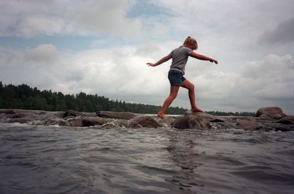 Hopping the rocks across the Mississippi River is a favorite activity at Itasca State Park.