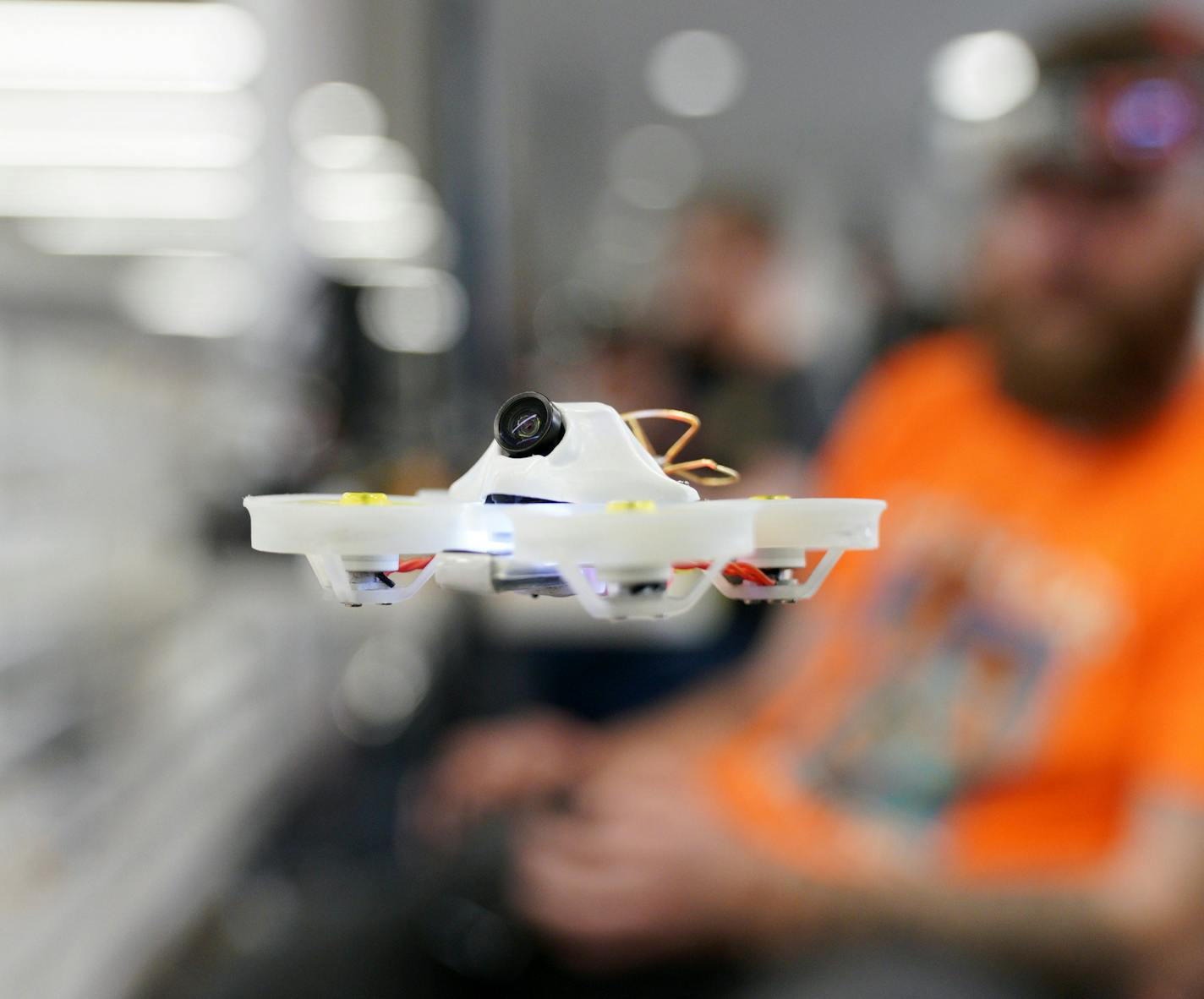 Chris Spangler of Bloomington hovered a drone a few feet from him as he waited for the start of the professional races. ] ANTHONY SOUFFLE &#x2022; anthony.souffle@startribune.com Students from Apple Valley High School and St. Louis Park High School took part in the first ever Minnesota high school drone racing tournament Saturday, May 18, 2019 at Apple Valley High School in Apple Valley, Minn.