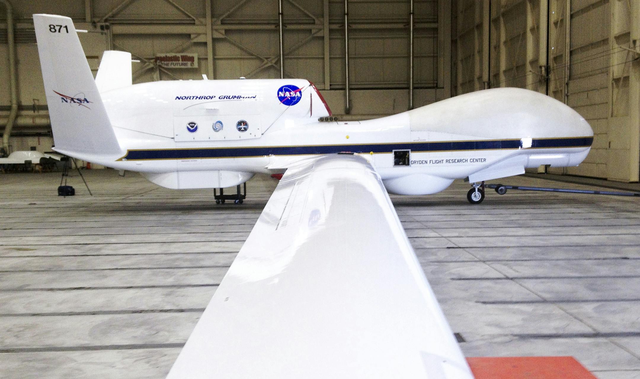 FILE - This Sept. 2013 file photo shows The Reaper drone, now known as a Global Hawk, at Edwards Air Force Base in California. The Federal Aviation Administration announced six states on Monday Dec. 30, 2013, that will develop test sites for drones, a critical next step for the march of the unmanned aircraft into U.S. skies. Alaska, Nevada, New York, North Dakota, Texas and Virginia will host the research sites, the agency said. (AP Photo/ Las Vegas Sun, Richard Velotta, File) LAS VEGAS REVIEW J