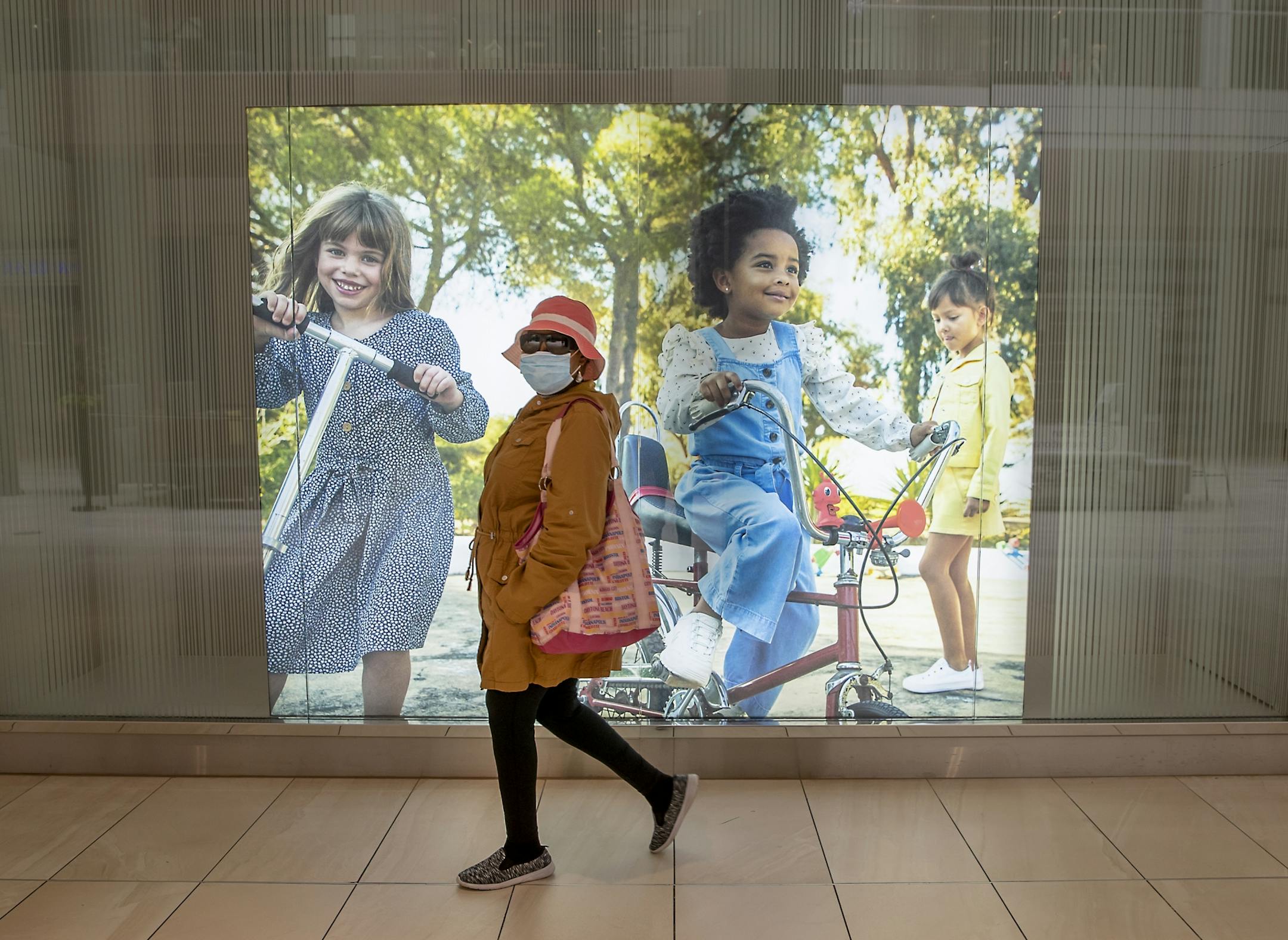 Shoppers made their way through Rosedale Center as some of the stores opened for business, Monday, May 18, 2020 in Roseville, MN.